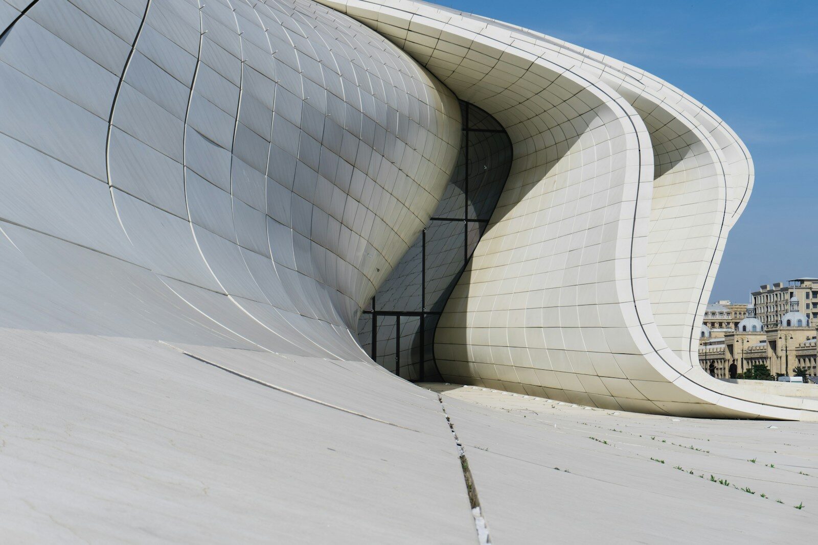 Modern white building with flowing architectural lines